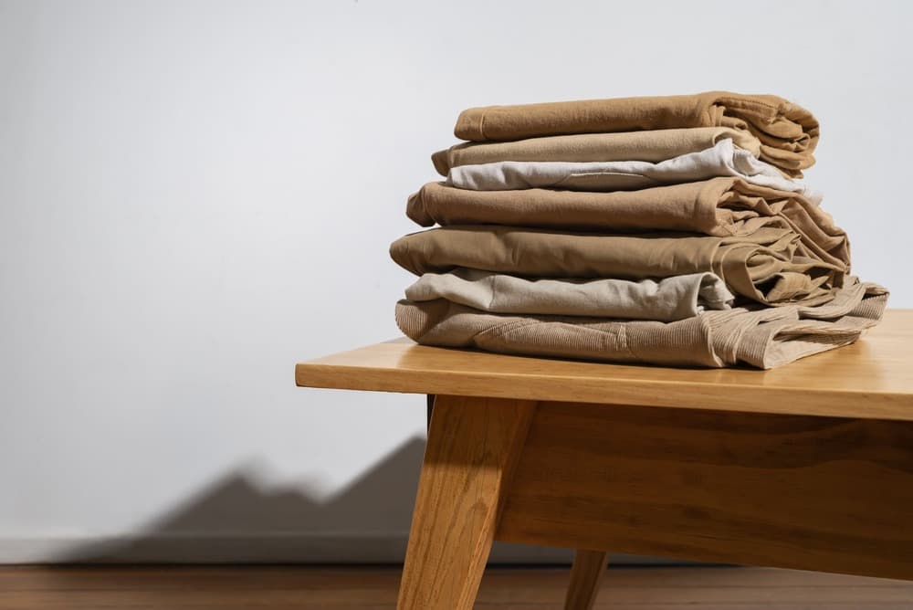 Neatly folded clothing from the laundry